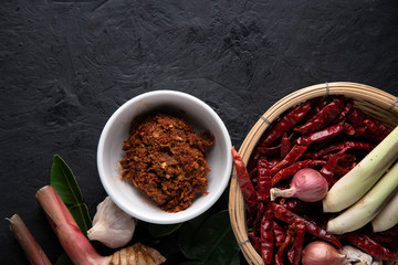 recipe book with fresh herbs south Asia and spices on wooden background, thai food. top view.