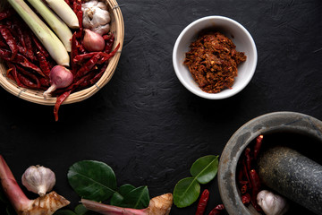recipe book with fresh herbs south Asia and spices on wooden background, thai food. top view.