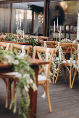 Boho wedding chair with eco decor for guests.