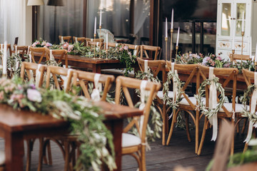 Boho wedding chair with eco decor for guests.