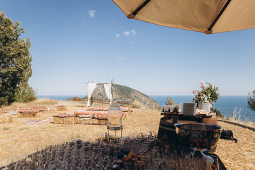 Boho wedding table with eco decor for guests.