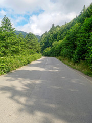    Empty asphalt road to the background blue sky