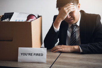 Male employee is stressed or angry while he is fired from being an employee of the company.