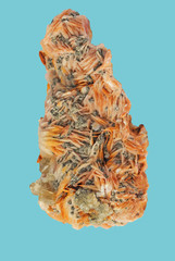 Natural raw Mineral barite on turquoise background
