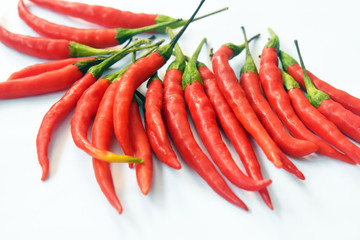 close up fresh red chilies, spicy isolated white background