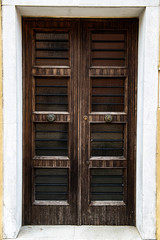 Old beautiful door in the Venetian style