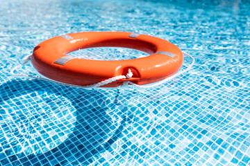 Orange salvage float in blue water