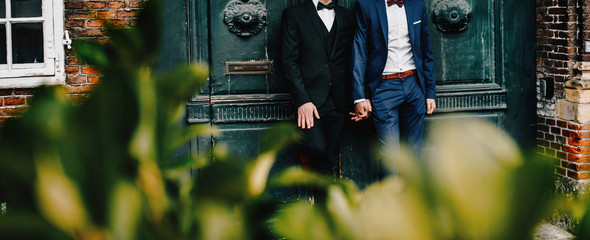 Gay couple walking around the city.