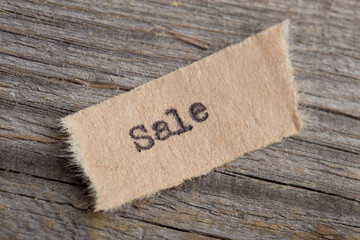 Sale typed text on a paper, real estate concept