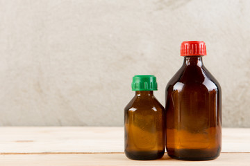 Retro pharmacy - vintage pharmacy bottles on wooden board