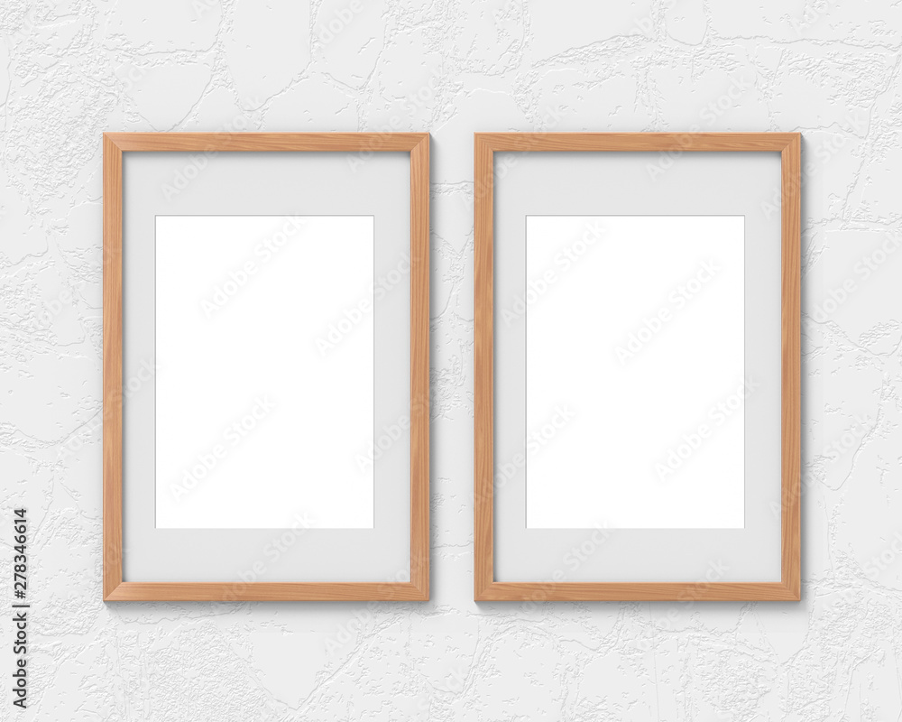 Fototapete set of 2 vertical wooden frames mockup with a border hanging on the wall. empty base for picture or 