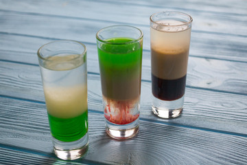 The alcohol shots on a table.