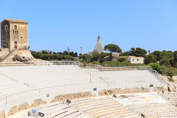 Modern spectator seats Teatro Greco, Santuario Madonna delle Lacrime,sunny day