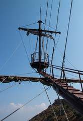 The mast of the ship against the sky. Symbol of success, heights. Rest on the Mediterranean sea in summer, Sunny day