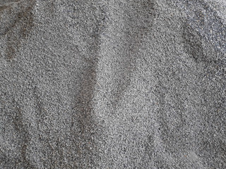 Gray stone piles for construction.