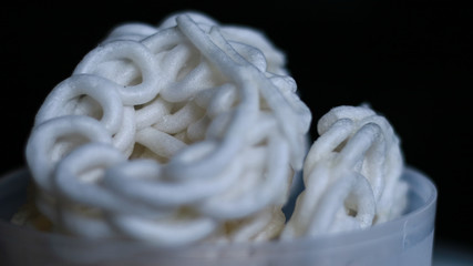 Kerupuk, Indonesian traditional crackers, on black background.