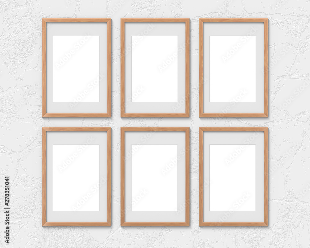 Poster set of 6 vertical wooden frames mockup with a border hanging on the wall. empty base for picture or 