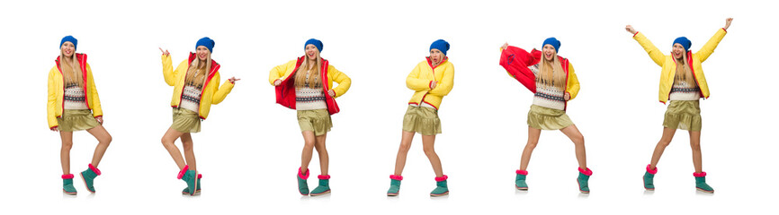 A girl in bright winter clothes isolated on white