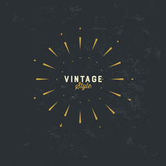 Vintage gold sunburst vector design element on grunge dark background