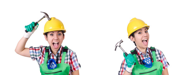 Female worker with hammer isolated on white