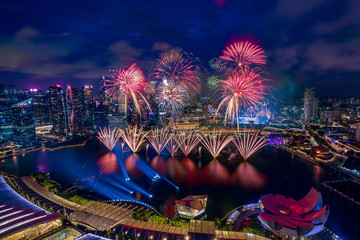 Aerial view of Singapore national day fireworks celebration at Marina Bay cityscape
