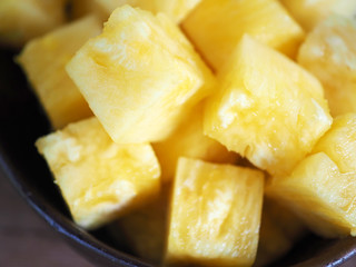 Close up of sliced pineapple chunks.