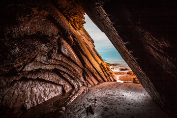 Beautiful natural cave in the flysch of the Itzurun beach in Zumaia. Basque Country