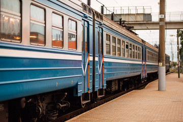 Obraz premium Passenger train on the station platform