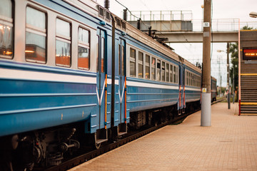 Obraz premium Passenger train on the station platform