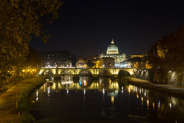Fototapeta premium Night scene of Rome, Tevere river with basilica in background