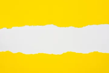 pieces of yellow paper on white background with copy space © aga7ta