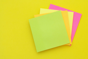 Note paper stickers on yellow background