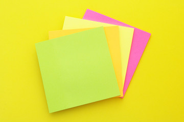 Note paper stickers on yellow background