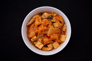 A Korean stew with fermented kimchi called Kimchi Jjigae