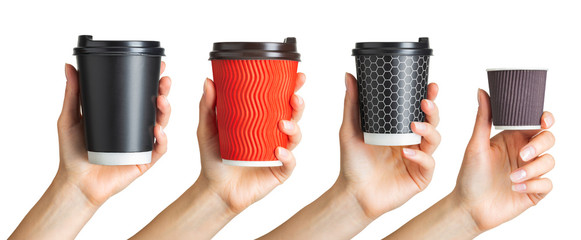 Set of women hands holding coffee paper drinking cup