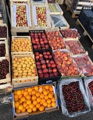 Fruit market with various colorful fresh fruits and vegetables