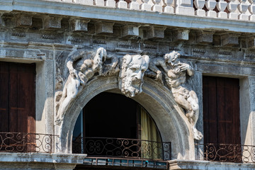 Elements of architecture of houses on the streets of the canals of the city of Venice in Italy. 