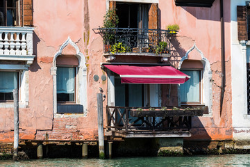 Elements of architecture of houses on the streets of the canals of the city of Venice in Italy. 