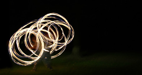 Long exposure fire poi, after dark