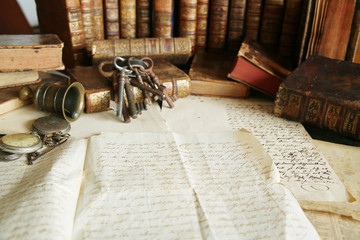 antique desk; workspace with old books and handwriting