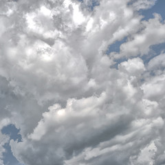 Hills, clouds, blue sky