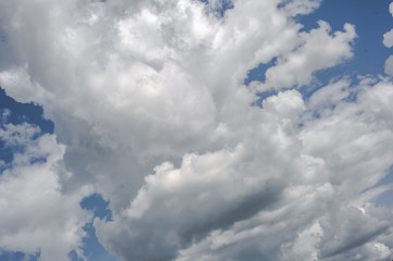 Hills, clouds, blue sky
