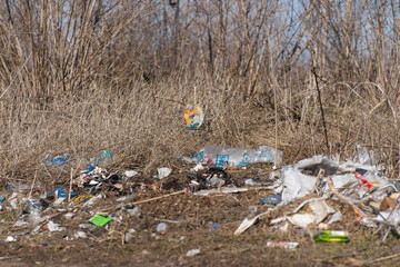 Trash on the agriculture field. Ecology problem and big harm to nature.