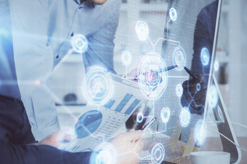 Multi exposure of tech drawings with man working on computer background. Concept of innovation.