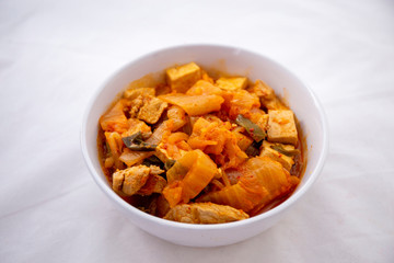 A Korean stew with fermented kimchi called Kimchi Jjigae