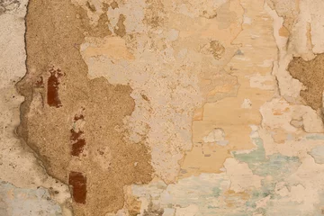 Abwaschbare Fototapete Alte schmutzige strukturierte Wand Alter, schäbiger, beschädigter Putz an den Wänden von Häusern aus nächster Nähe