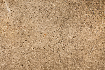 old shabby damaged plaster on the walls of houses close-up