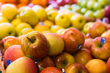appetizing apples on counter in market