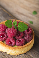 Cake with fresh raspberries and mint