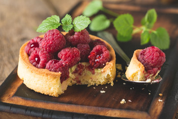 Cake with fresh raspberries and mint